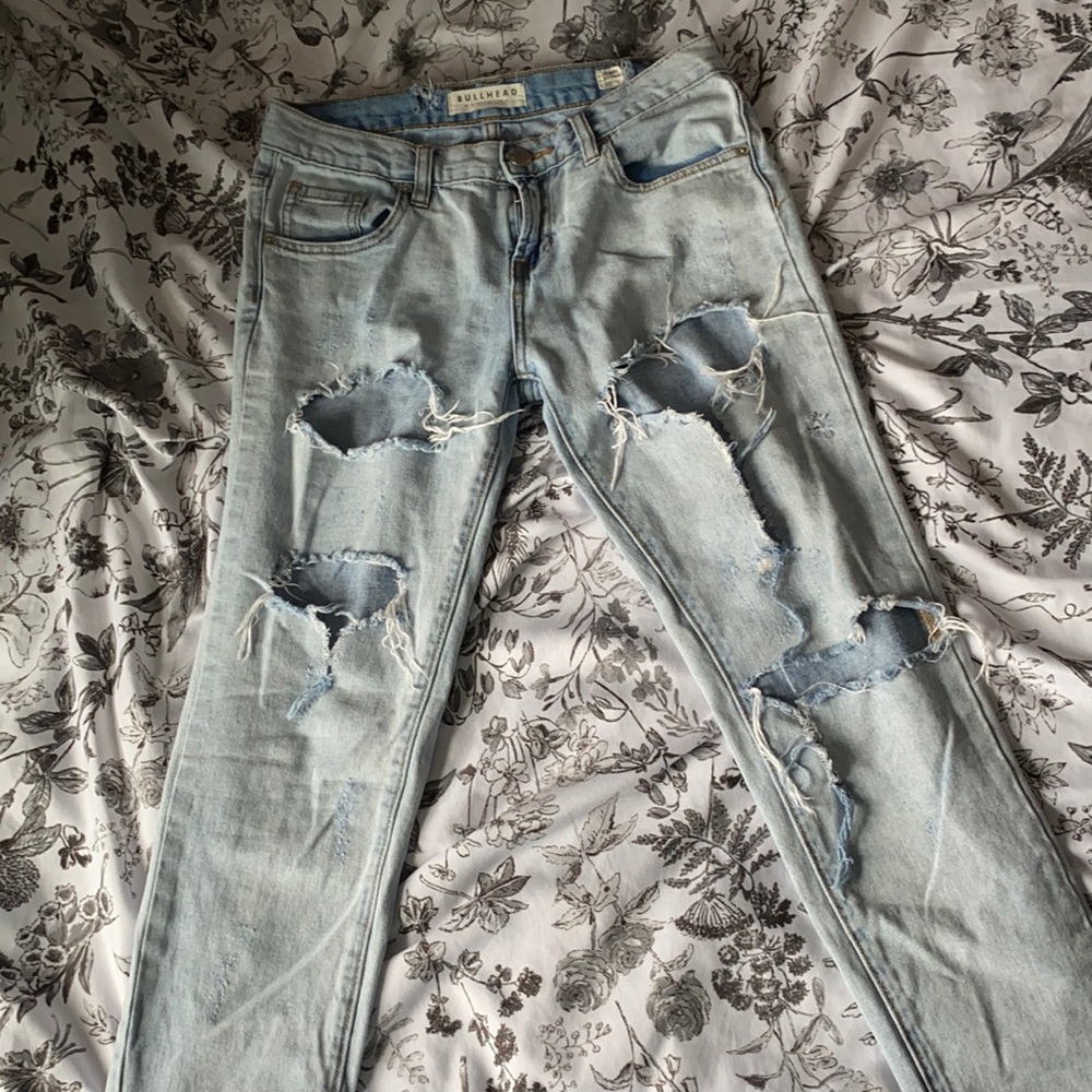 Extremely distressed bullhead jeans